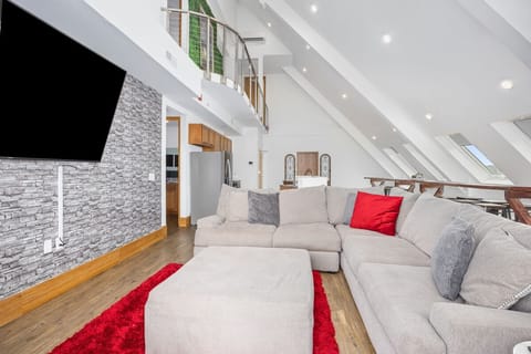 Presidential Penthouse | Living area | 55-inch Smart TV with digital channels, TV