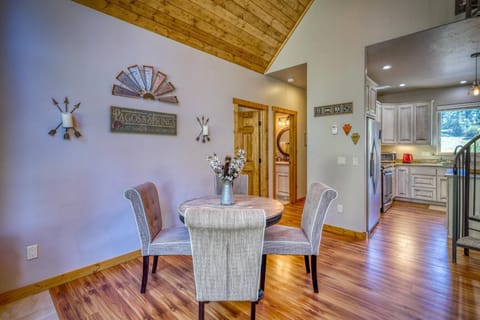The dining room with a wood-burning stove for convenience and ambiance.