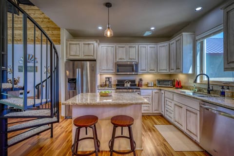 Kitchen is directly to your left upon entry.