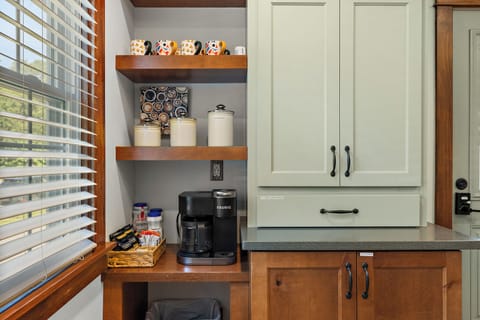 Home has a coffee bar and all the fixings to make a great cup of coffee 