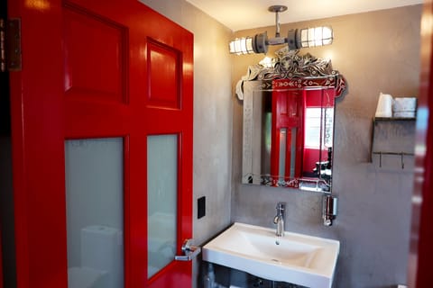 Shower, designer toiletries, hair dryer, towels