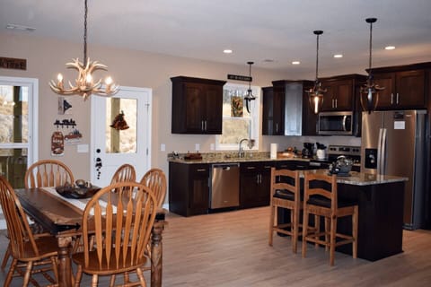 Fully equipped kitchen and dining area.