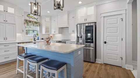 Refrigerator with two ice machines.  Produces Craft Ice in the bottom maker