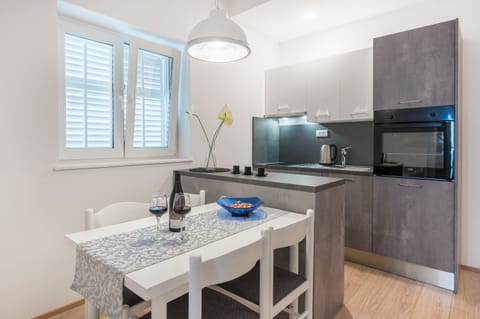 Comfort Apartment, 1 Bedroom, Balcony, Courtyard View | Private kitchen | Fridge, electric kettle, blender, cleaning supplies