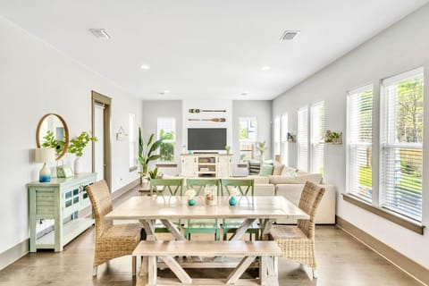Enjoy the open Living/Dining area to stay connected with all of your guests.