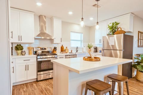 Gourmet Kitchen: Whip up culinary delights in this stylish space with modern appliances and ample light!