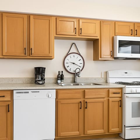 Fully Furnished Kitchen with a gas stove