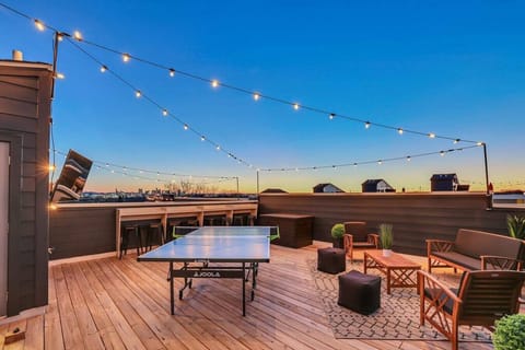 Enjoy some ping pong, TV, and cornhole on Elvis` rooftop!