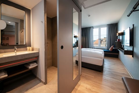 Shower, eco-friendly toiletries, hair dryer, towels