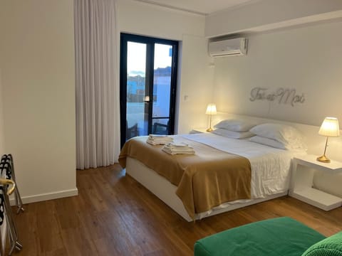 Bedroom with a private terrace