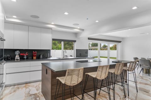 Appliances in the kitchen are all stainless steel and durable quality.