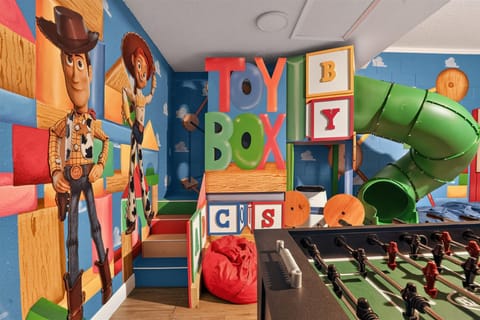 A colorful Toy Story game room filled with fun activities for kids.