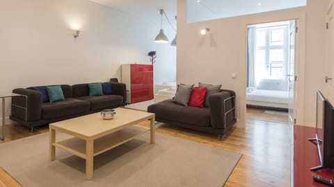 Bright, modern and welcoming, this open-plan living area is the perfect place to relax, recharge, or enjoy time together after exploring Lisbon. #LivingRoom #ModernStay #CityEscape #HomeAwayFromHome #Portugal #PT #Lisboa