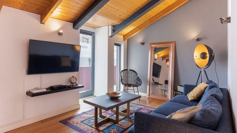 This modern and unique decored living room with a great view will be the perfect place to relax after a day of exploring our beautiful Lisbon  #airbnb #airbnblisbon #portugal #pt #lisbon #decoration #city #vacations