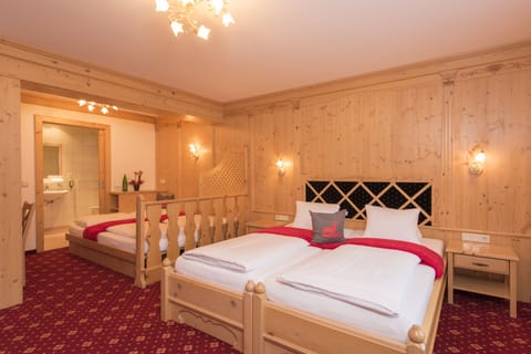 Desk, laptop workspace, free WiFi, bed sheets