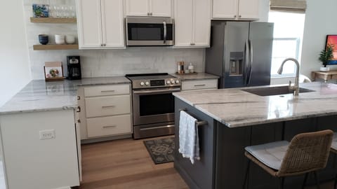 The kitchen is fully stocked with everything you need to prepare meals.
