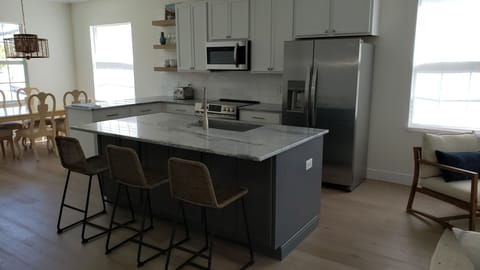 Guests can sit at the island while you are preparing gourmet meals