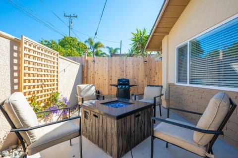 Outdoor patio with propane BBQ and seating for 6.Perfect for hanging out outside