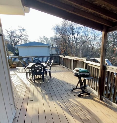 Picnic table and grill on large back deck