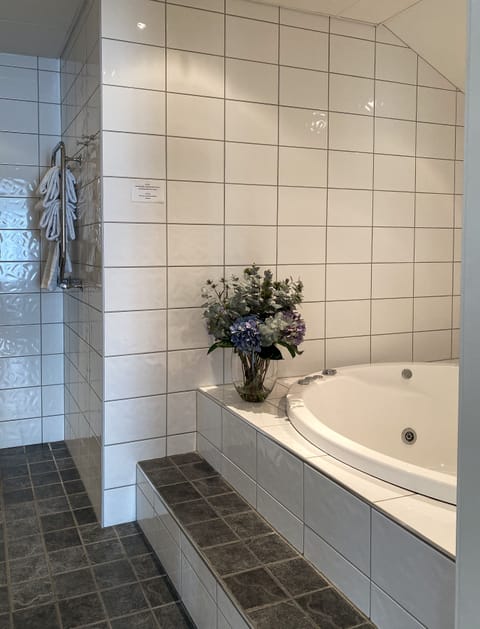 Superior Suite (Pool access included) | Bathroom | Shower, hair dryer, towels, soap