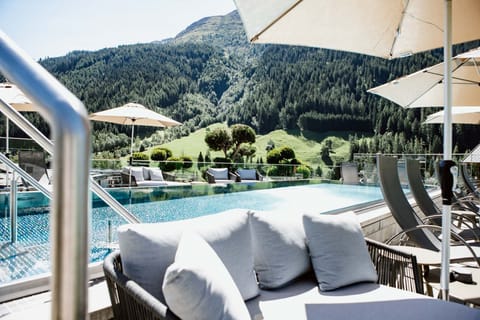 Outdoor pool, open 2:00 PM to 8:00 PM, sun loungers