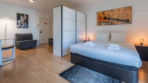 Bright and modern studio with a comfortable double bed, stylish decor, and open living space designed for a relaxing stay in Lisbon. #StudioApartment #ModernLiving #CityStay #CozyInterior #LisbonStay #Portugal #PT #Lisbon