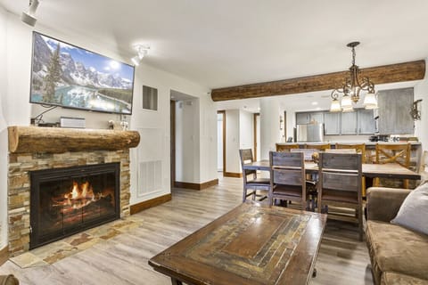 Living Room with Wood Fireplace and 55"Living Room with Wood Fireplace, 55" TV and Bose Bluetooth Stereo SystemTV and Bose Bluetooth Stereo System