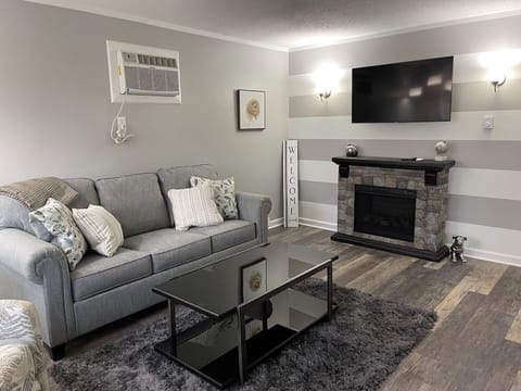 A sofa bed is tucked away here for extra sleeping space. Cozy linens included! 