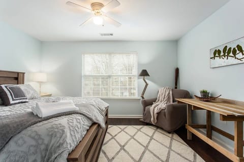 Relax in the Stylish Master Suite overlooking a very peaceful backyard setting.