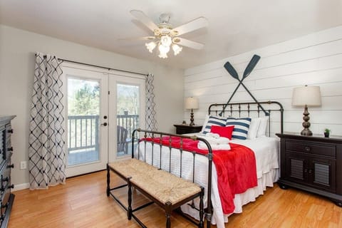 First floor master bedroom overlooking deck and river below!