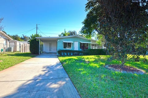 Front view driveway with carport