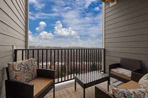 Private balcony with stunning Branson Strip views — the perfect spot for morning coffee or sunset relaxation