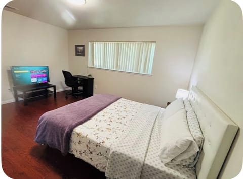A queen sized bed with comfortable mattress, a private bathroom inside the room 