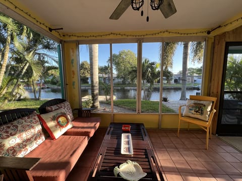 Enjoy coffee or a glass of wine while sitting in the screened in patio. 