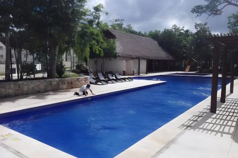 Condo, 2 Bedrooms, Patio, Garden View | Pool | Outdoor pool