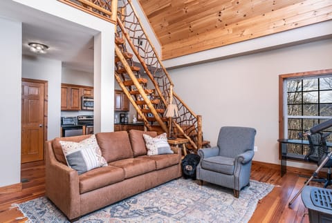Loft kitchenette with queen sleeper sofa.

