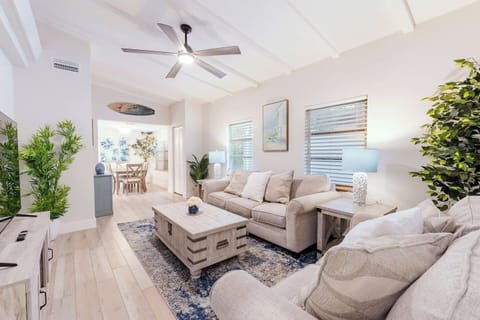 large and spacious living room with 55 inch smart tv