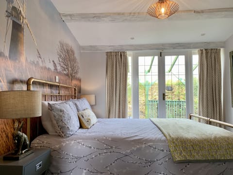 French doors in bedroom leading to private patio
