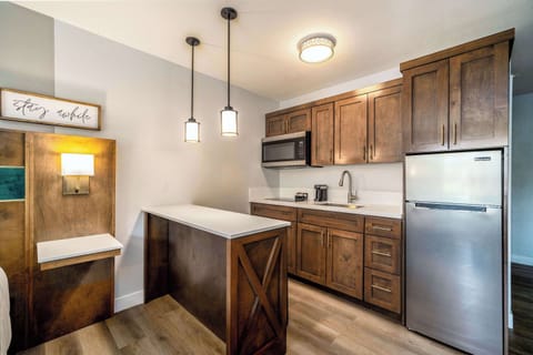 Superior Suite, 1 King Bed, Non Smoking | Laptop workspace, blackout drapes, iron/ironing board, free WiFi