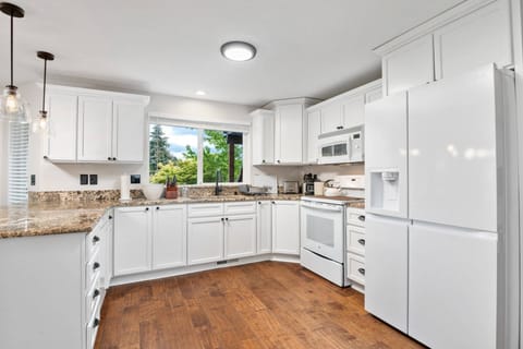 The kitchen has ample counter space and up to date appliances.
