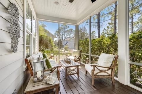 Spacious, breezy outdoor living with lounge seating and dining for six, perfect for morning coffee or evening cocktails.