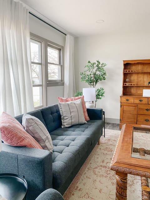 Get cozy in our updated living room, complete with seating and a Roku Enabled TV