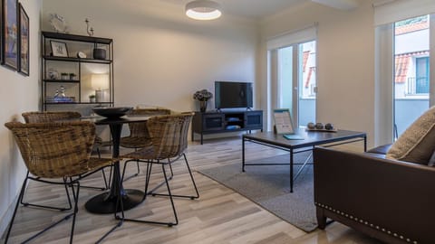 A bright, stylish living and dining space with contemporary details and plenty of natural light for a relaxed Lisbon stay.
#portugal #Pt #lisboa #LovelyStay #LisbonLiving