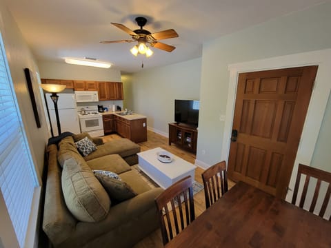 Cozy kitchen, living room, dining areas.