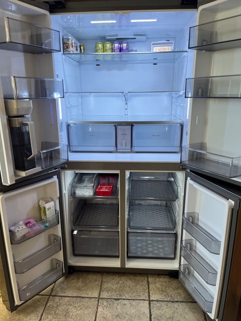Large French door refrigerator and freezer, with filtered auto-fill pitcher.