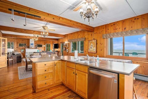 Delight in Preparing Classic Meals on the Master Lodge`s Expansive Kitchen Island