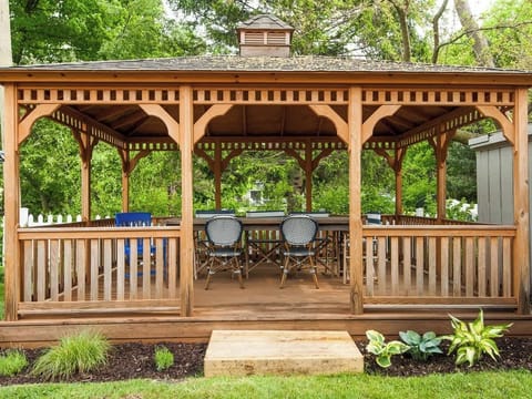 Backyard Gazebo with Ceiling Fan, Light and Seating for 10