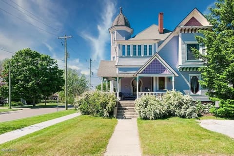 Experience SoHa Summers at The Purple House - A Vintage Vacation Home Moments Away From Downtown