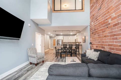 Kick Back and Catch the Big Game in Broadway Getaway`s Spacious Living Room