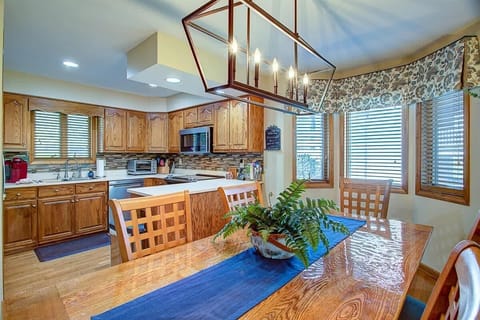 The dining area is open to the kitchen and living area and easily seats six.